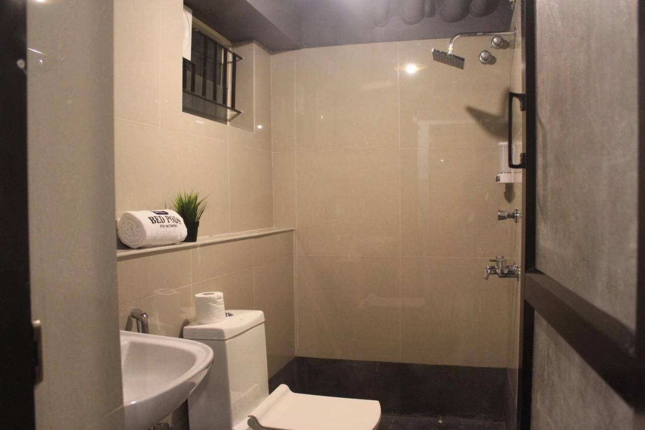 Bed Pods Hostel Thiruvananthapuram Bagian luar foto